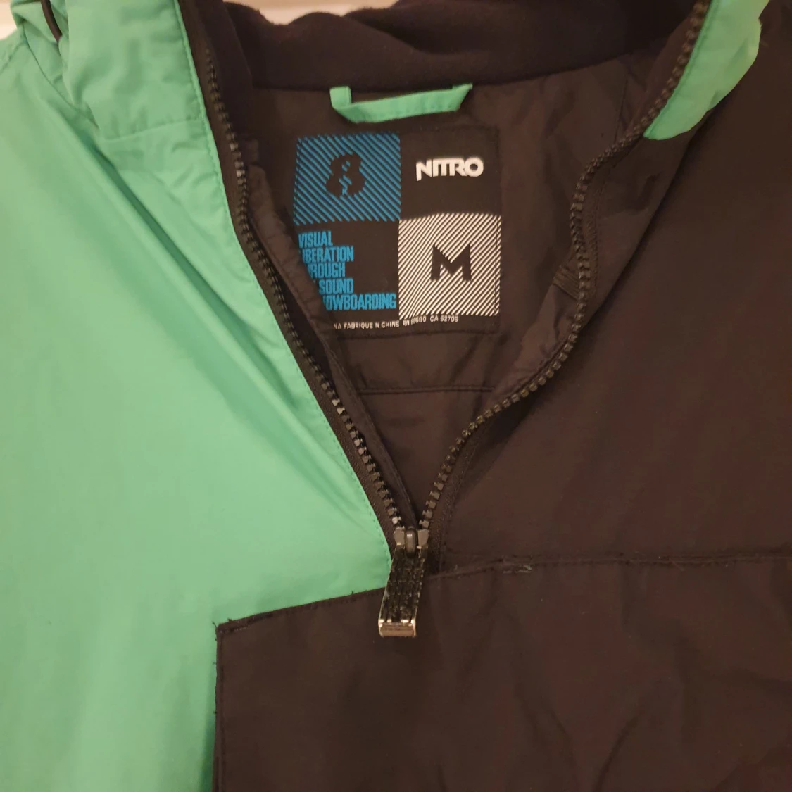 Grön och svart Snowboardjacka från Nitro - 3