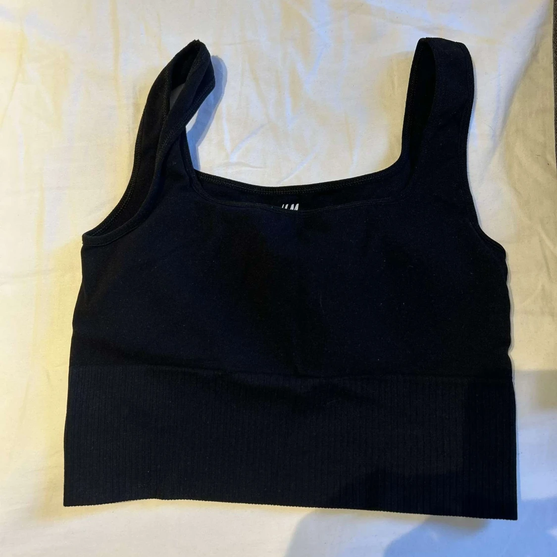 Svart sportig linnetopp från H&M - 1