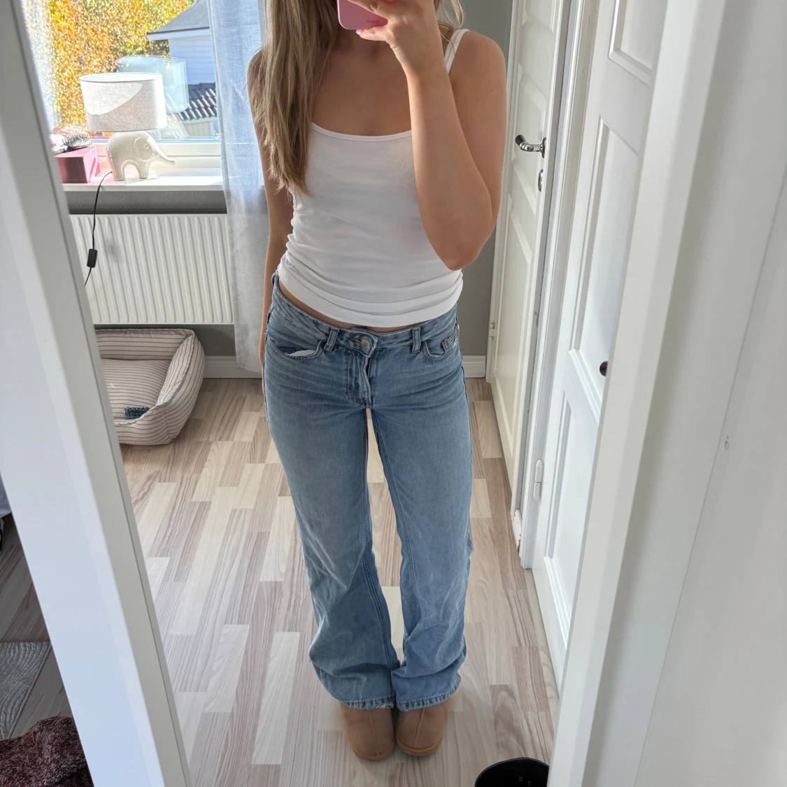 Ljusblå bootcut jeans