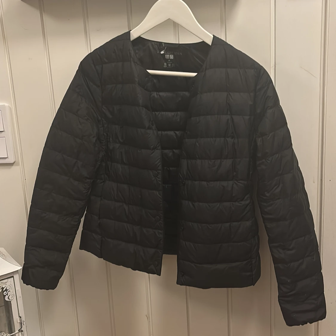 Svart dunjacka från Uniqlo XS