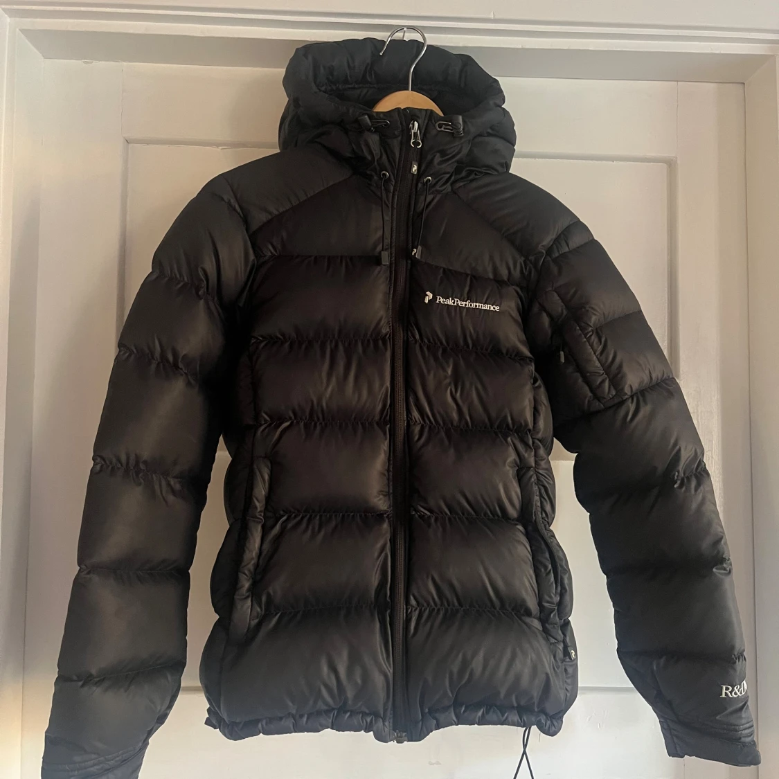 Svart dunjacka Peak Performance XS - 1