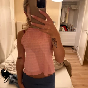 topp  - rosa topp från nelly, använts en gång