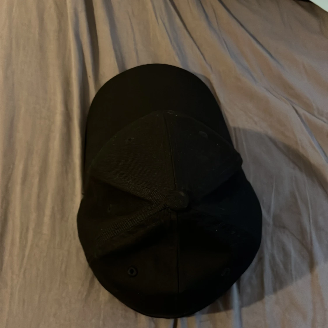 Svart keps från Flexfit Youth.  - 1