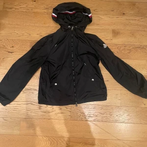 Moncler windbreaker  - Black Moncler windbreaker with scanning logo.