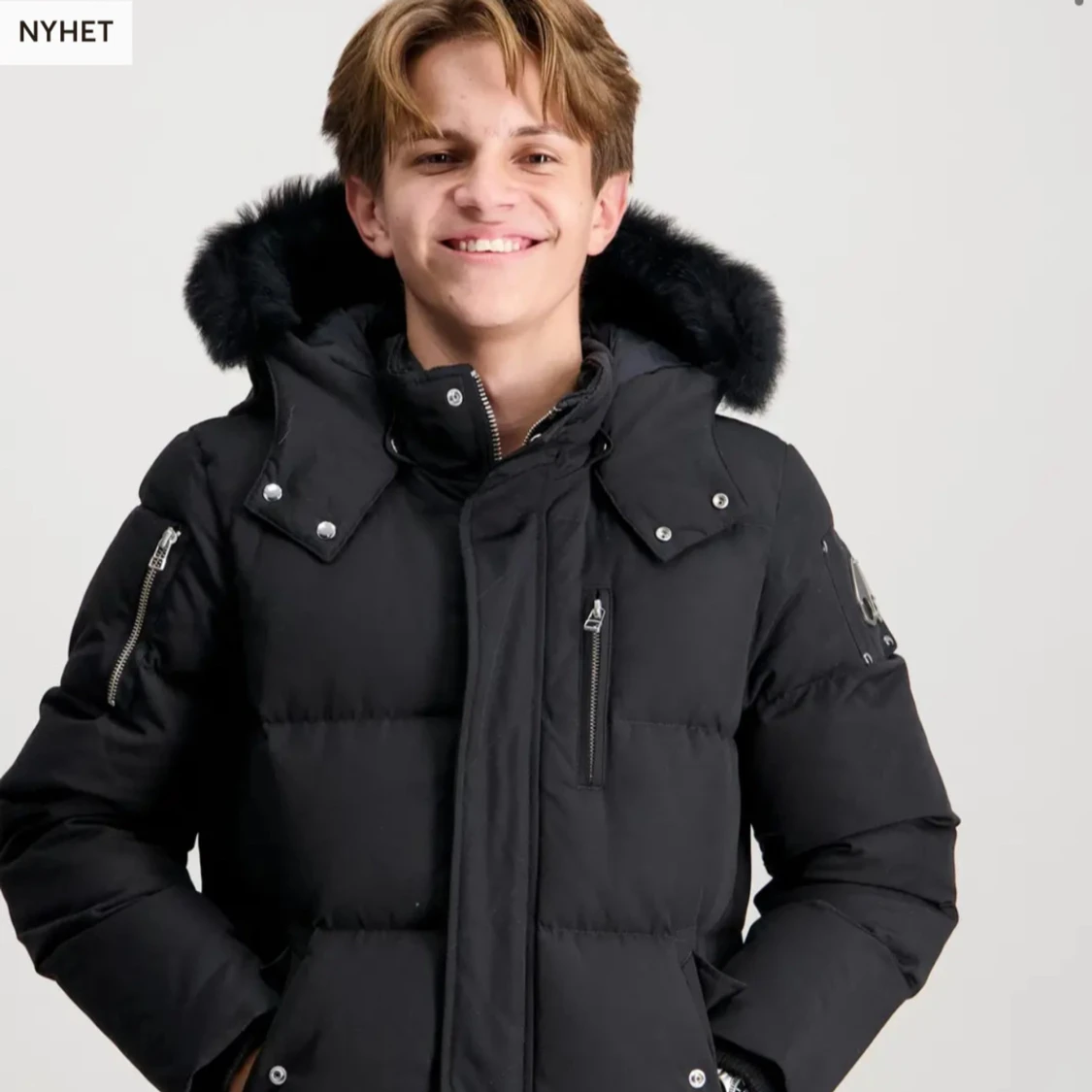 Svart pufferjacka från Moose Knuckles