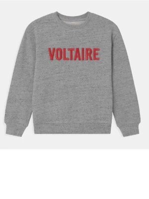 Grå sweatshirt från Zadig & Voltaire - Snygg grå sweatshirt med röd VOLTAIRE-text framtill. Tröjan har rund halsringning, långa ärmar och ribbade muddar vid ärmslut och nederkant. Perfekt för en avslappnad och trendig look.
