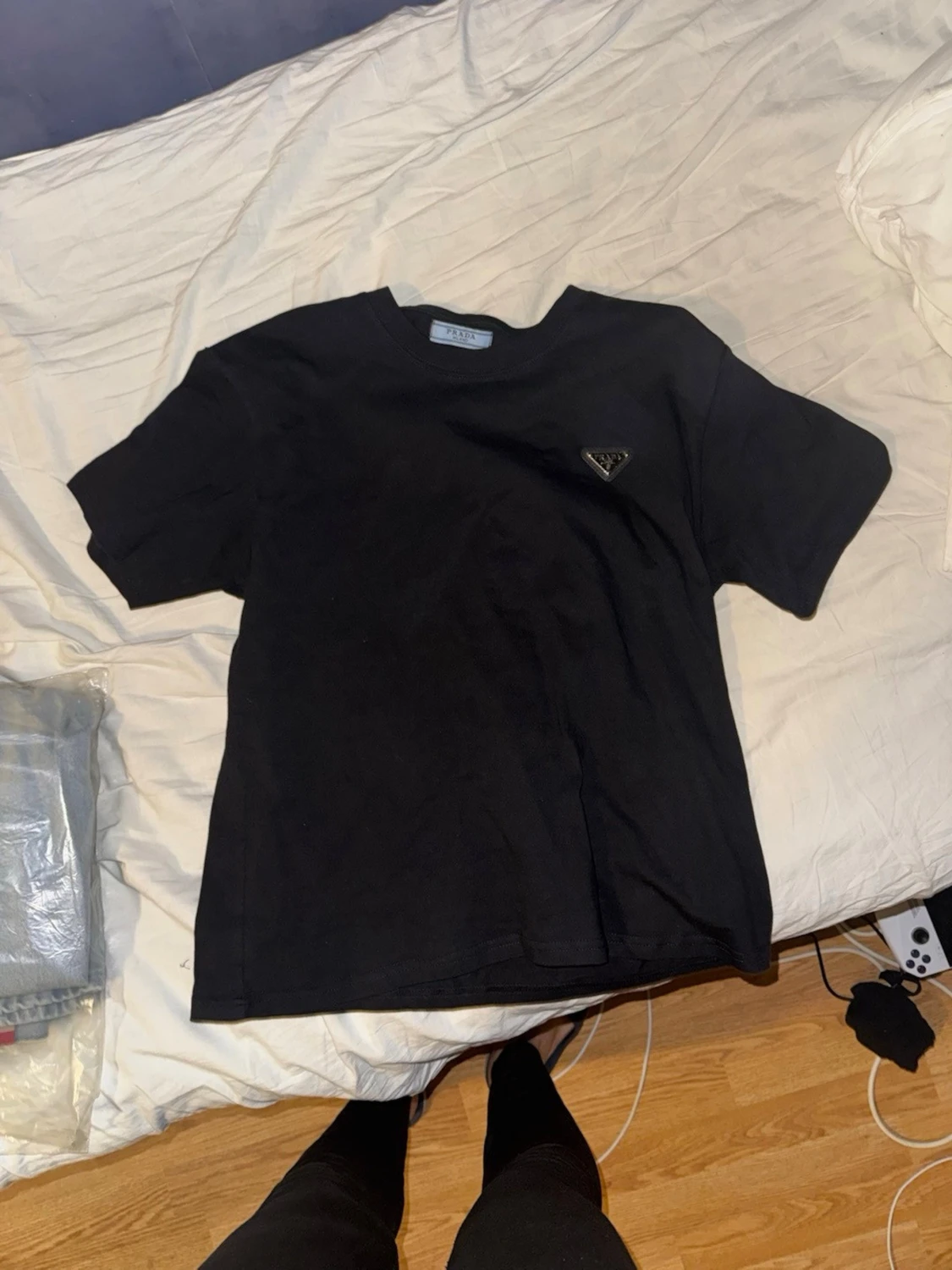 Svart hoodie från Prada med dragkedja