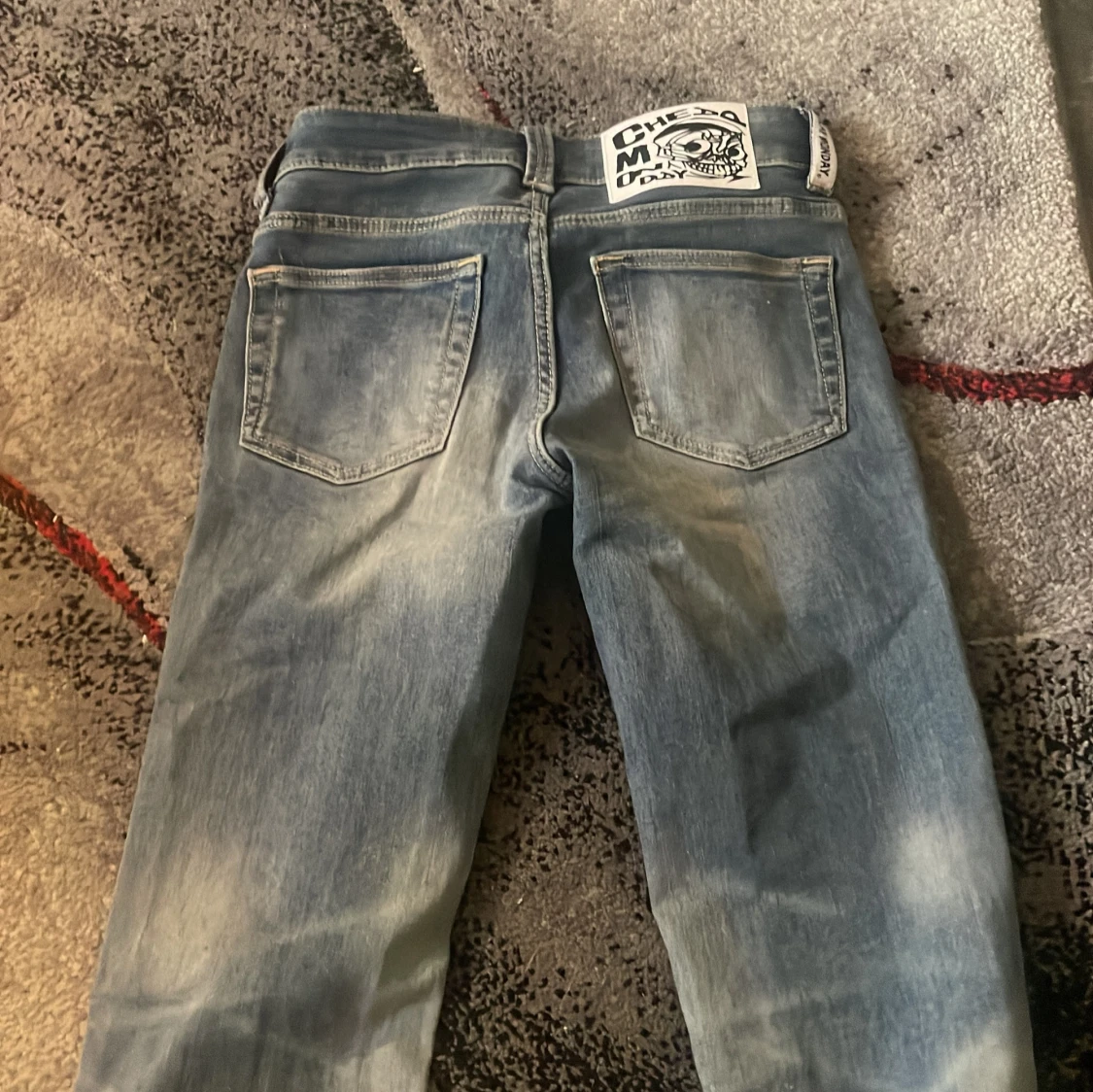 Blå bootcut jeans från Cheap Monday