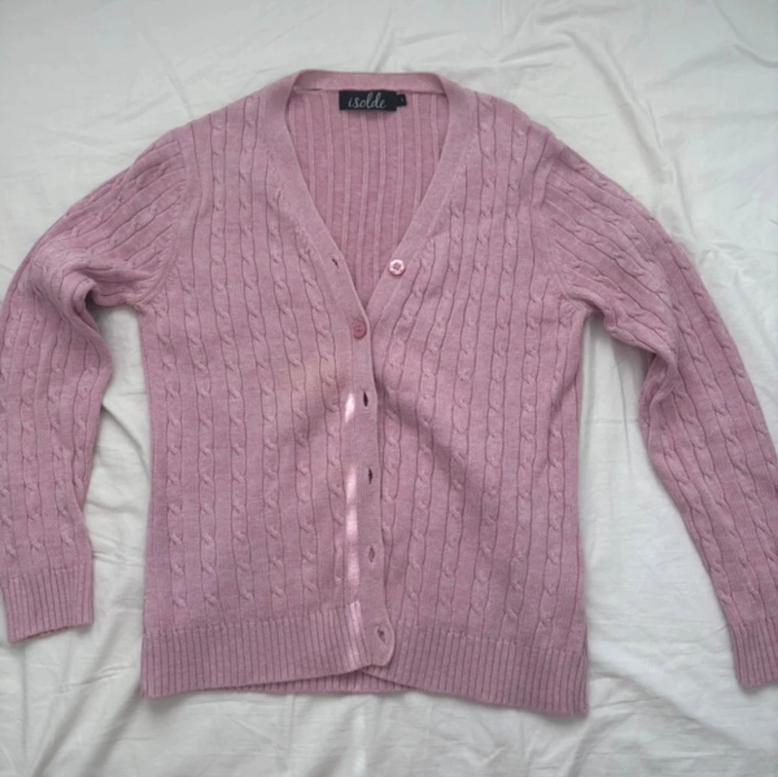 Ljusrosa kabelstickad kofta Isolde