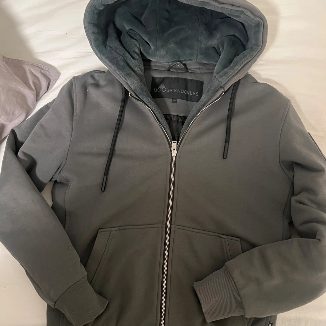 Mörkgrön jacka från Moose Knuckles