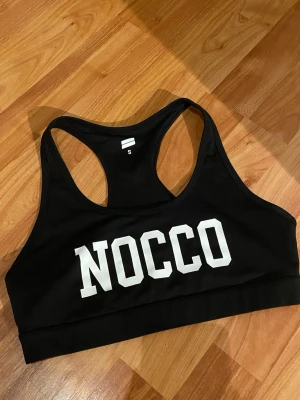 Nocco sporttopp  - Säljer en nocco sporttopp i fint skick i storlek S