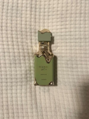 Lattafa Eclaire Pistache  - Använd fåtal gånger, helt full