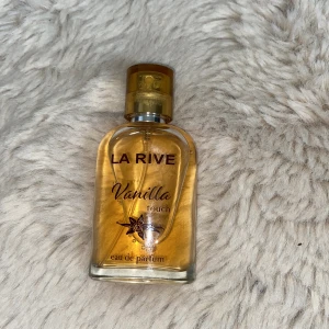 La Rive Vanilla Touch Parfym - La Rive Vanilla Touch eau de parfum 30 ml, liite använd, se bild 2 på hur mkt som finns kvar.