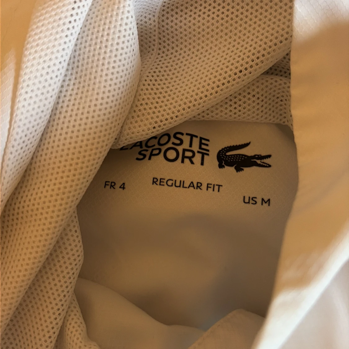 Vit vindjacka från Lacoste Sport - 1