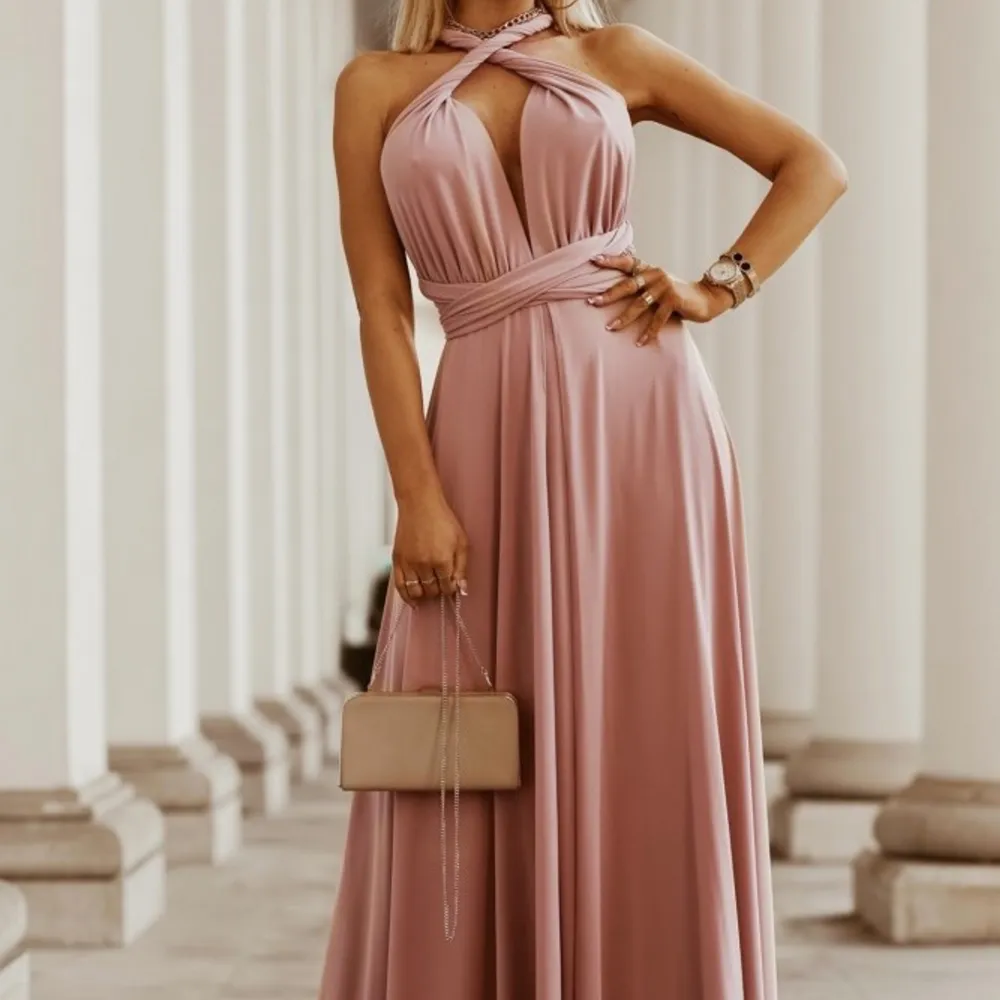 Balklänning rosa knyt hur du vill, man kan ha den på flera olika sätt helt ny. Klänningar.