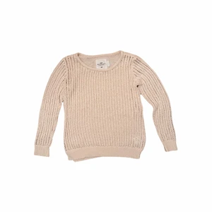 Stickad tröja  - Glesstickad tröja, köpt för länge sedan men mycket bra skick då den använts fåtal gånger. 