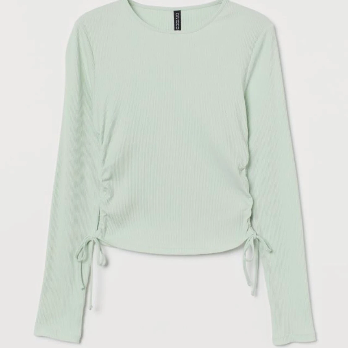 Långärmad grön tröja