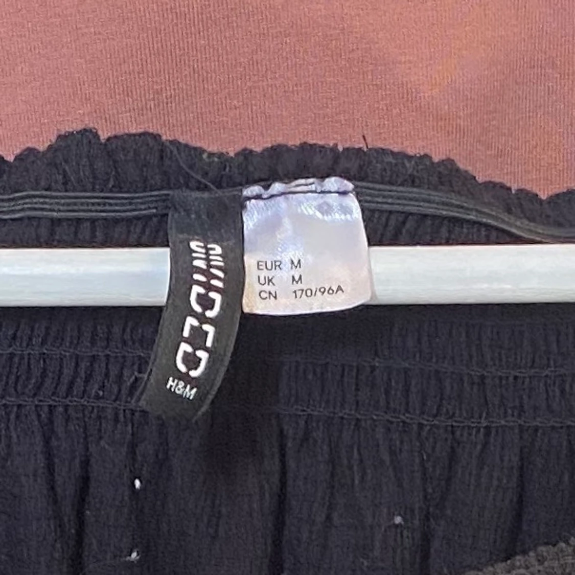 Magtröja med långa ärmar.  - 90