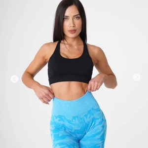 Nvgtn sport-bh/stöd - Sport-bh med bra stöd från nvgtn. Andvänd fåtal gånger. Passar xs-s.