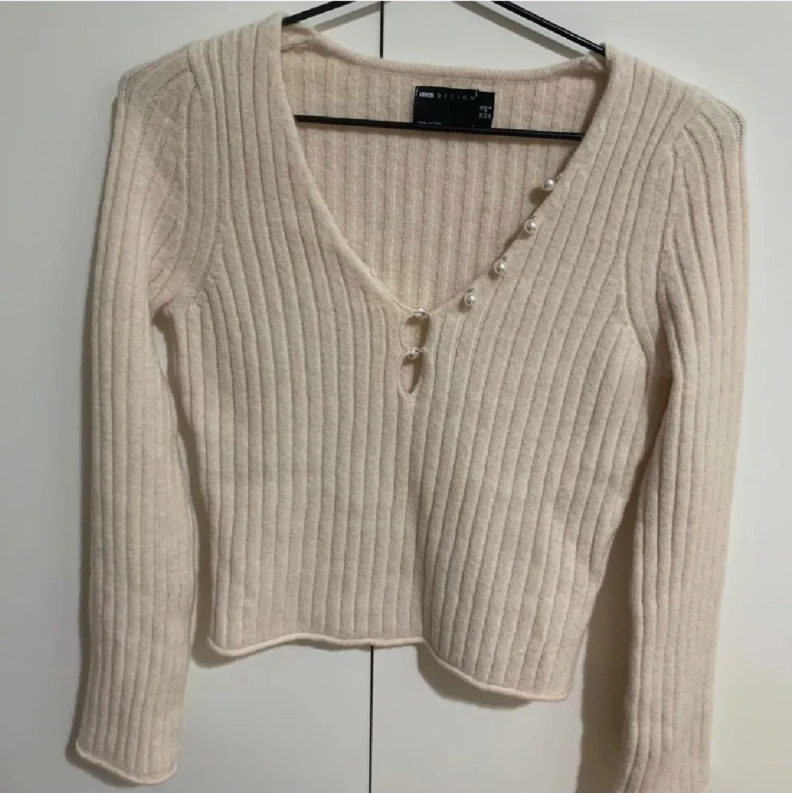 Beige tröja i storlek 40 (M) - 90