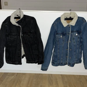 Fodrade jeansjackor - En svart och en blå fodrad jeansjacka. Nypris 500:-   Säljes för 150:-/st