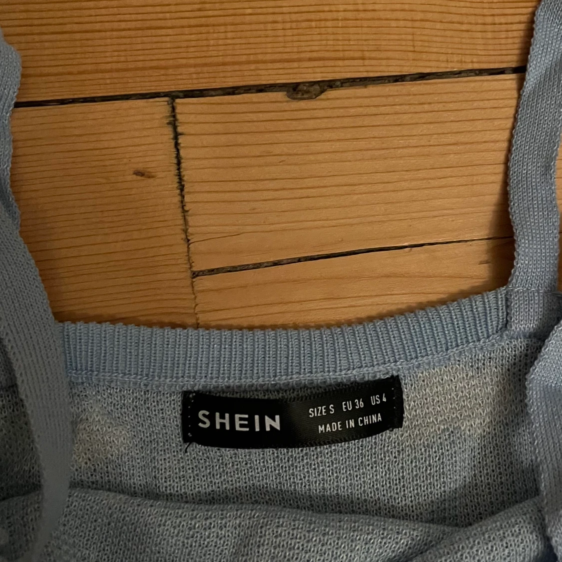 Blått linne med måln på - 90