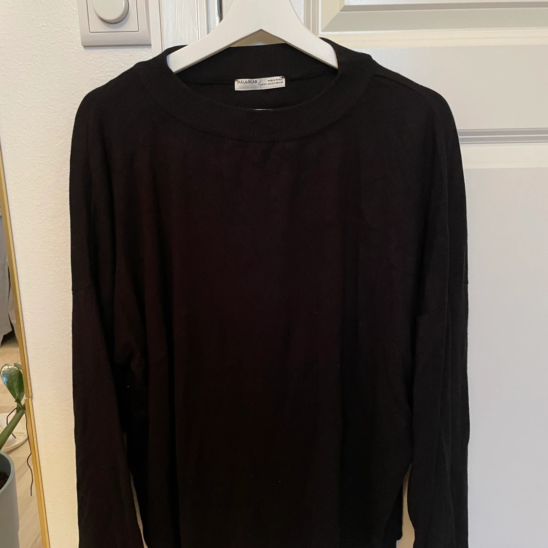 Svart stickad tröja 