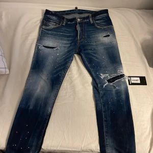 Dsquard2 jeans blåa( byter mot tiger Gucci keps! - Säljer mina äkta dsq2 jeans börjar tröttna på dom köpte dom för 6300kr byter mot tiger Gucci keps! 