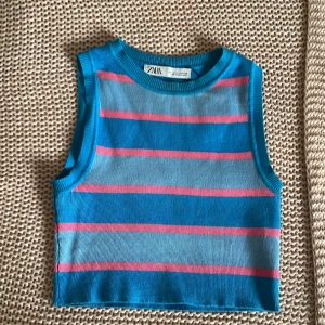 somrig topp - jättefint material och som i nyskick!