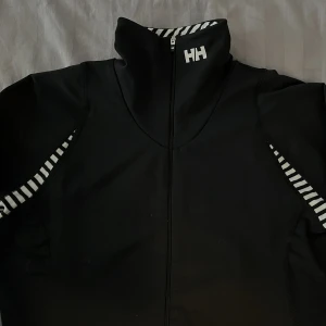 Helly Hansen träningskofta  - Aldrig använd.