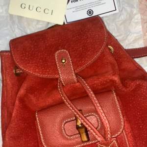 Red Gucci bag