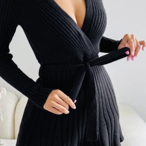 Black knitted dress - Feminine elegant and stylish dress which can be dressed up or down depending on the accessories. Very soft, comes with belt.