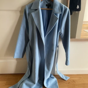 Kappa - Blå kappa, storlek S. Knappt använd. 