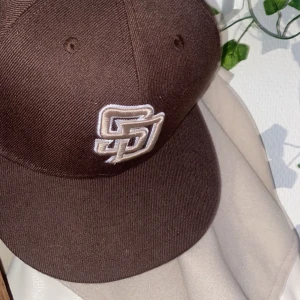 Keps  - köpt innan här på plick Mått ”7 3/8” 58cm 