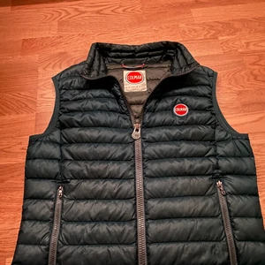 Colmar väst - Används föriktigt. Inga skador eller liknande.