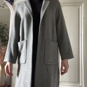 Kappa  - Grå kappa från H&M