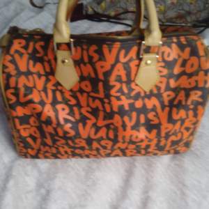 Luis Vuitton  Louis Vuitton Speedy cloth handbag Very good condition Orange