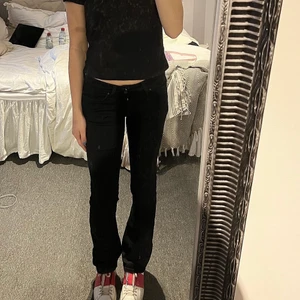 Lågmidjade jeans - Svarta lågmidjade jeans från Lee