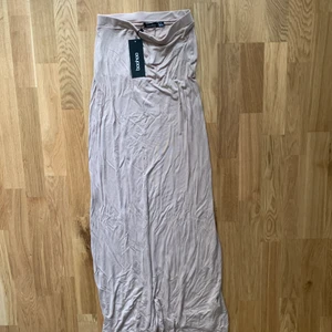 Långkjol - Aoandbänd skönt material