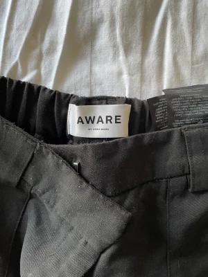 Cargo byxor - Svarta cargo byxor.