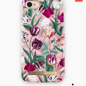 Ideal of Sweden skal - Ideal of Sweden skal för iPhone 8/7/6/6S. Bra skick, guldet vid namnbrickan är lite avskrapat. Namnet på skalet är vintage tulips. 