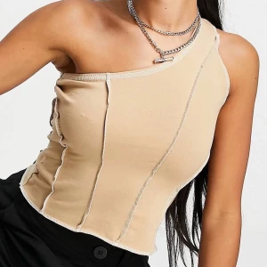 ASYOU - Brun enaxlad topp med synliga sömmar - Använts 1 gång. Ordinarie pris 188kr men säljer den för 100kr 