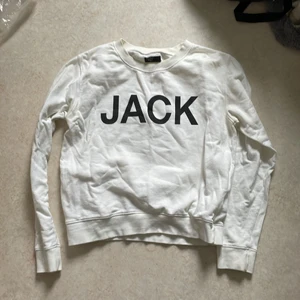 Vit sweatshirt - Vit sweatshirt med tryck.