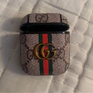 Fake Gucci airpod case