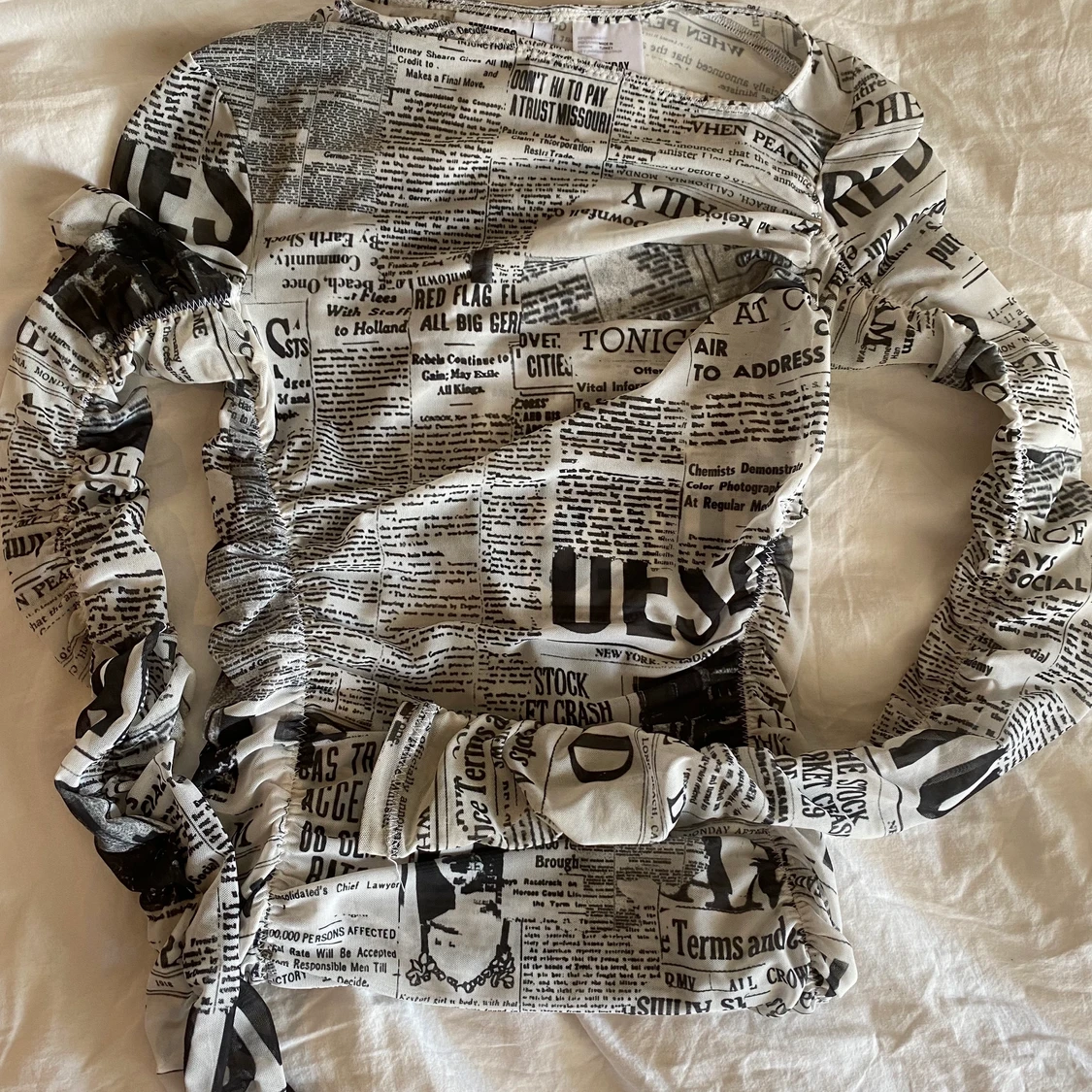 Mesh topp i tidningstryck