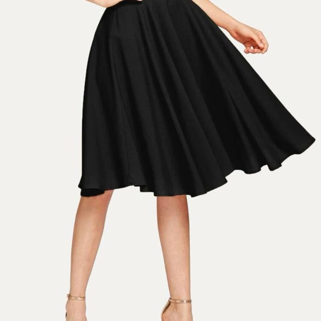 Klocad kjol, ny i förpackning 