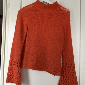 Orange stickad - Orange stickad köpt second hand