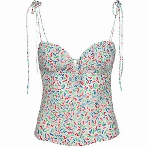 Realisation Par-top - Realisation par-top i bra skick!  Justerbara band vid både axlar & bröst.  Snörningen vid bröstet är trasigt (därav sänkt pris) men justeringen fungerar fortfarande som den ska!  