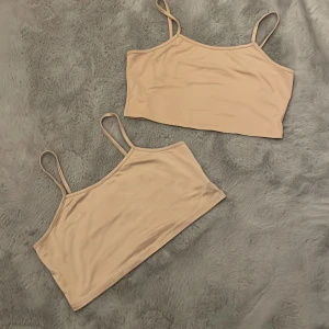 Två sov toppar - Två stycken sov toppar  väldigt korta använd 1 gång