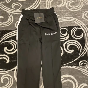 Palmangels byxor (svart) - Bra kvalite, bra tyg skön att ha på sig, påse ingår 